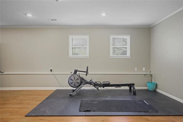 3916 S Martin Way, Lithia Springs, GA 30122 - exercise area with crown molding, recessed lighting, baseboards, wood finished floors, and visible vents