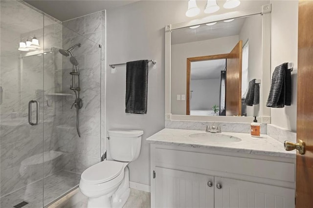 3916 S Martin Way, Lithia Springs, GA 30122 - bathroom with vanity, baseboards, toilet, and a shower stall