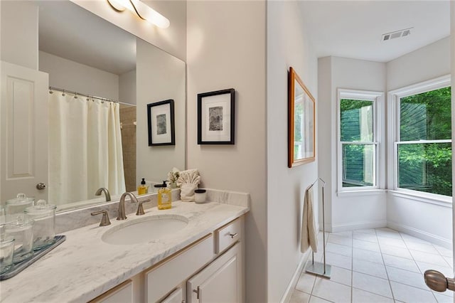 453 Carter Ave SE, Atlanta, GA 30317 - full bath featuring tile patterned flooring and vanity