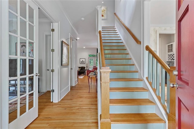 453 Carter Ave SE, Atlanta, GA 30317 - staircase with wood finished floors, french doors, and ornamental molding