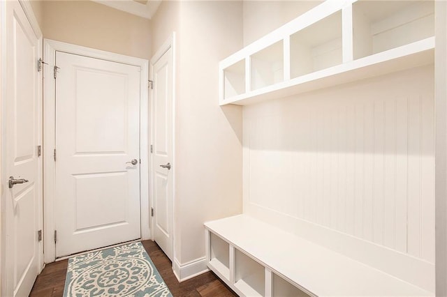 mudroom with dark wood-style floors