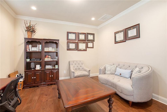 interior space with crown molding, baseboards, wood finished floors, and recessed lighting