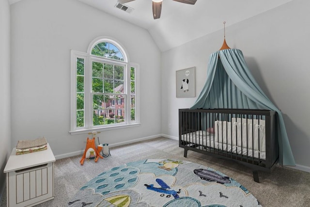 2934 Mill Grove Ter, Dacula, GA 30019 - bedroom featuring carpet flooring, multiple windows, vaulted ceiling, and a crib