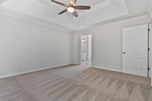 2934 Mill Grove Ter, Dacula, GA 30019 - carpeted spare room with a tray ceiling, ceiling fan, and ornamental molding