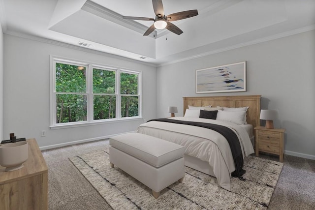 2934 Mill Grove Ter, Dacula, GA 30019 - carpeted bedroom with a raised ceiling, crown molding, and ceiling fan
