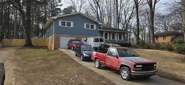 split level home featuring a garage