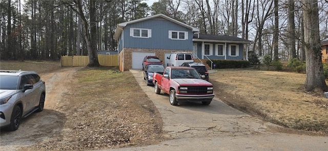 split level home featuring a garage