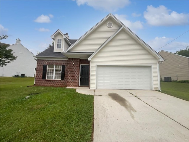 5480 Walnut Ln, Lithonia, GA 30038 - view of front facade featuring brick siding, a front lawn, concrete driveway, and a garage