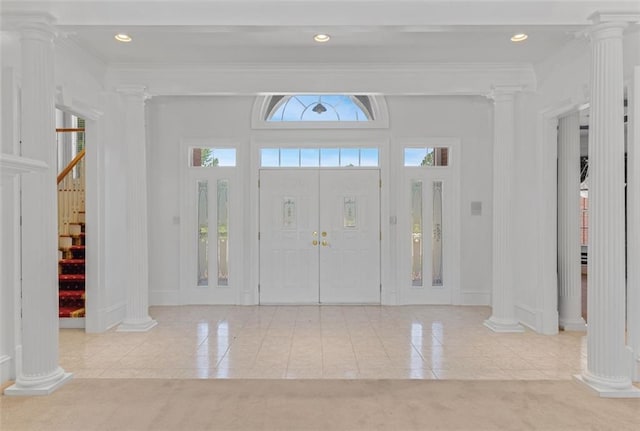 3030 Berry Rd, Loganville, GA 30052 - tiled entryway featuring decorative columns, ornamental molding, stairway, baseboards, and recessed lighting