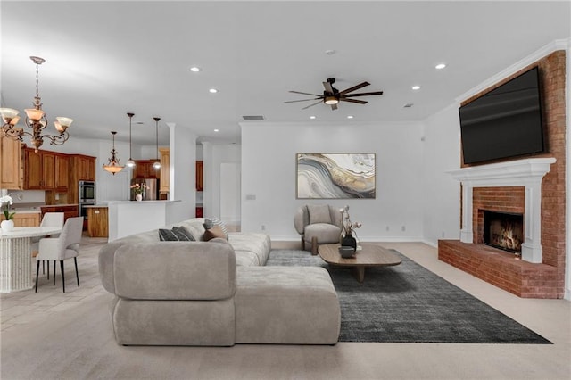 3030 Berry Rd, Loganville, GA 30052 - living area featuring a chandelier, recessed lighting, a ceiling fan, and a fireplace