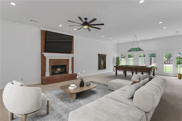 3030 Berry Rd, Loganville, GA 30052 - carpeted living area featuring recessed lighting, billiards, a fireplace, a ceiling fan, and baseboards