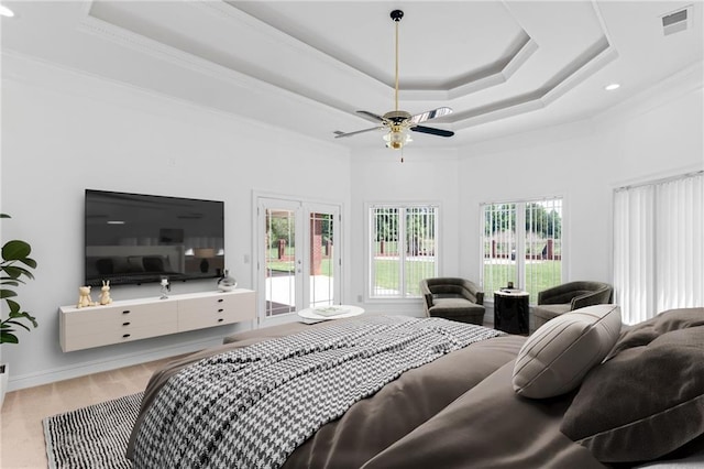 3030 Berry Rd, Loganville, GA 30052 - bedroom featuring access to outside, a raised ceiling, wood finished floors, french doors, and ceiling fan