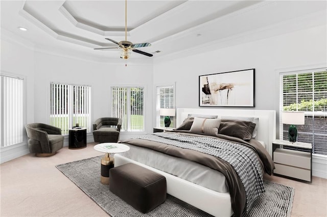 3030 Berry Rd, Loganville, GA 30052 - bedroom with light carpet, a raised ceiling, a high ceiling, a ceiling fan, and ornamental molding