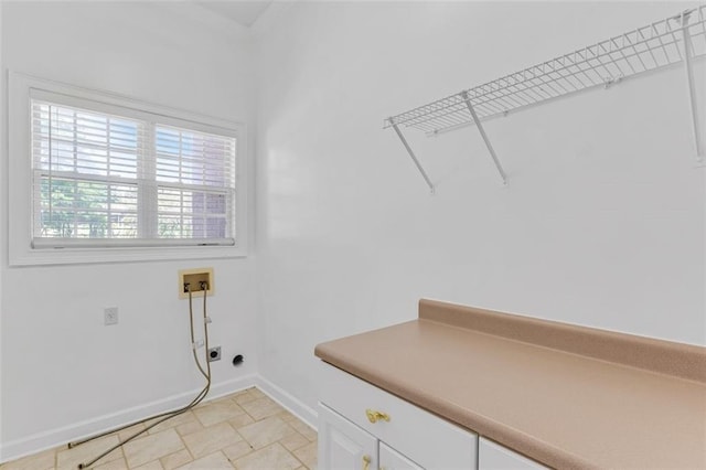 3030 Berry Rd, Loganville, GA 30052 - washroom featuring hookup for a washing machine, baseboards, cabinet space, and electric dryer hookup