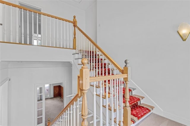 3030 Berry Rd, Loganville, GA 30052 - stairs with carpet floors and a high ceiling