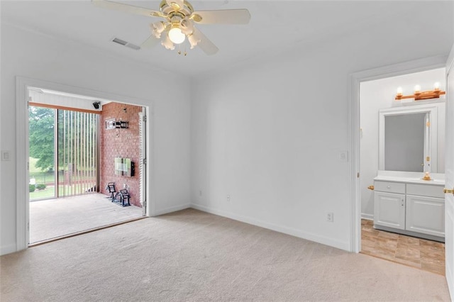 3030 Berry Rd, Loganville, GA 30052 - spare room featuring light colored carpet, ceiling fan, and baseboards
