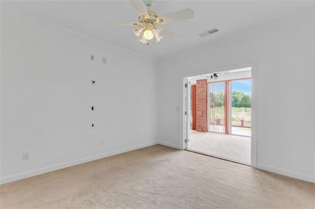 3030 Berry Rd, Loganville, GA 30052 - unfurnished room featuring carpet flooring, ceiling fan, baseboards, and ornamental molding