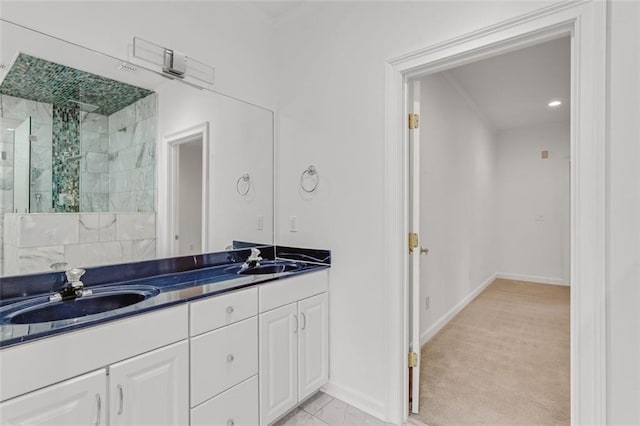 3030 Berry Rd, Loganville, GA 30052 - bathroom featuring a shower stall, double vanity, baseboards, and recessed lighting