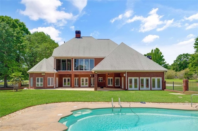 3030 Berry Rd, Loganville, GA 30052 - back of property featuring french doors, a chimney, a patio, and brick siding