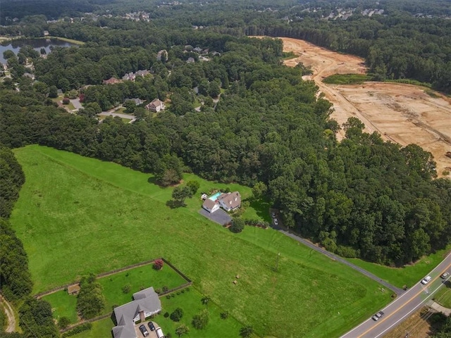 birds eye view of property featuring a rural view