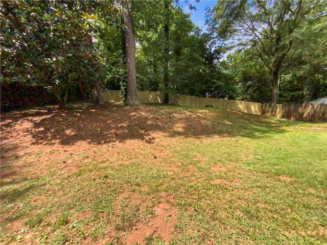 view of yard with fence