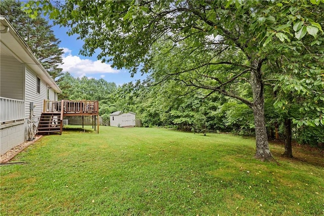 250 Vermont St, Demorest, GA 30535 - view of green lawn with stairs, a deck, and an outbuilding
