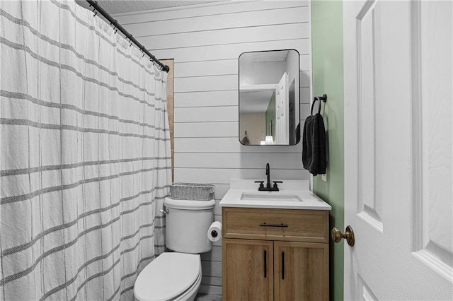 250 Vermont St, Demorest, GA 30535 - full bathroom with toilet, vanity, wooden walls, a shower with shower curtain, and a textured ceiling