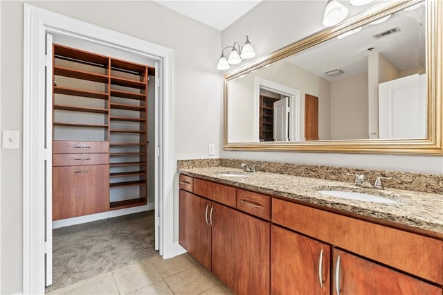 bathroom featuring vanity and tile patterned floors