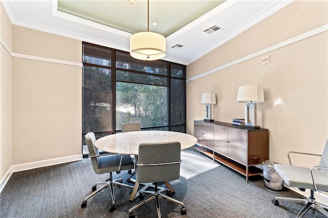 office with crown molding, carpet floors, and a wall of windows