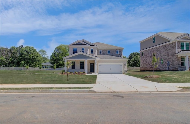 craftsman-style home featuring concrete driveway and an attached garage