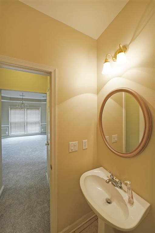2747 Harper Woods Dr, Marietta, GA 30062 - bathroom with a sink and baseboards