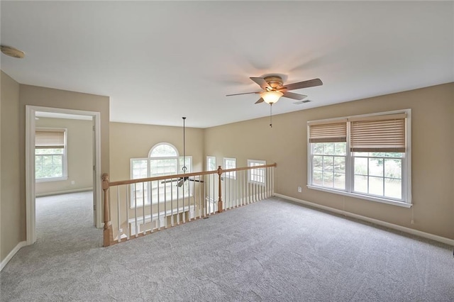 2747 Harper Woods Dr, Marietta, GA 30062 - unfurnished room featuring a ceiling fan, carpet flooring, healthy amount of natural light, and a smoke detector