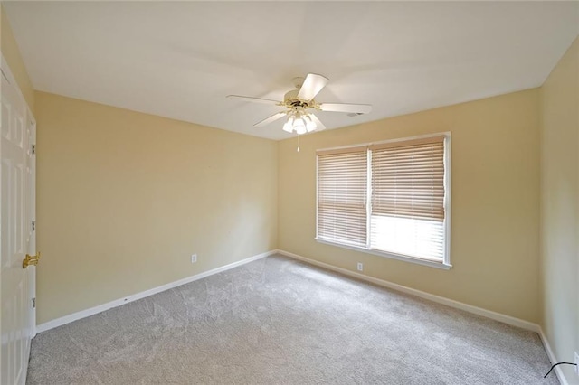2747 Harper Woods Dr, Marietta, GA 30062 - spare room with light colored carpet, a ceiling fan, and baseboards