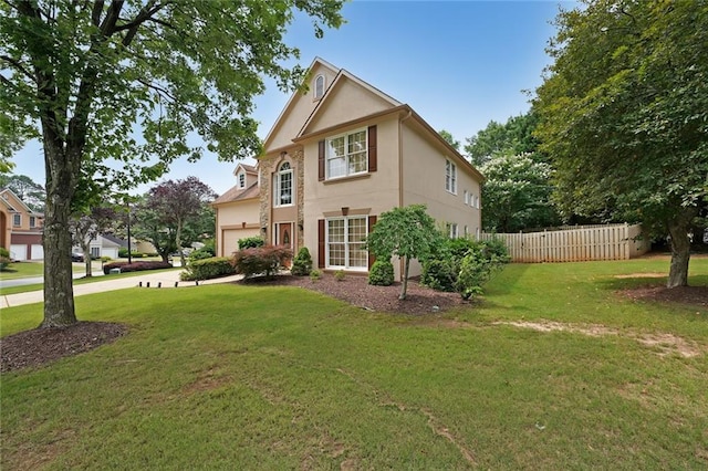 2747 Harper Woods Dr, Marietta, GA 30062 - view of property exterior with stucco siding, an attached garage, and driveway