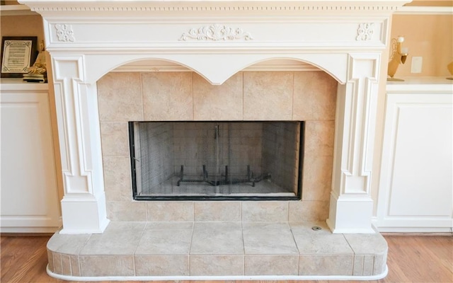 details with a fireplace and hardwood / wood-style floors