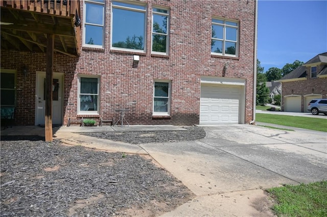 view of property exterior with a garage