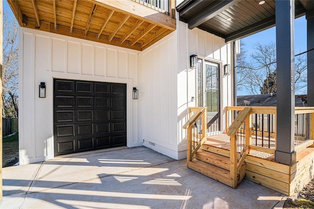 view of exterior entry featuring a garage