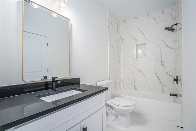 full bathroom featuring vanity, toilet, and tiled shower / bath