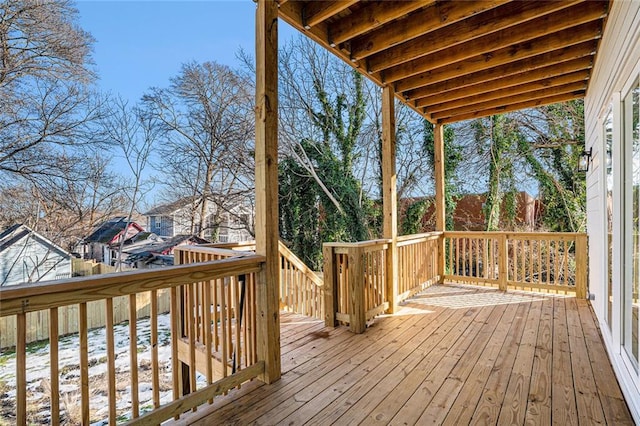 view of snow covered deck