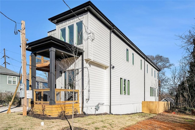 view of property exterior with a balcony