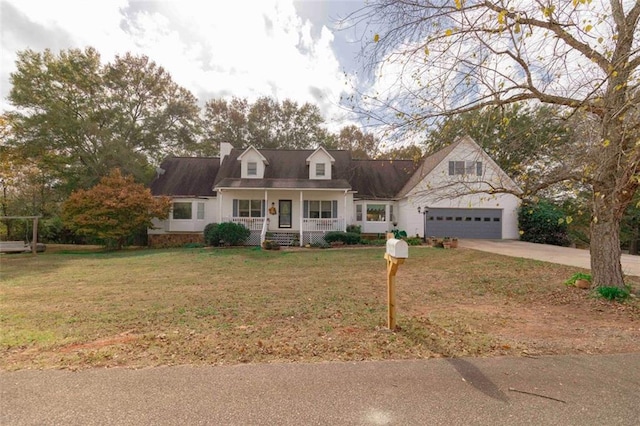 cape cod home with a porch and a front lawn