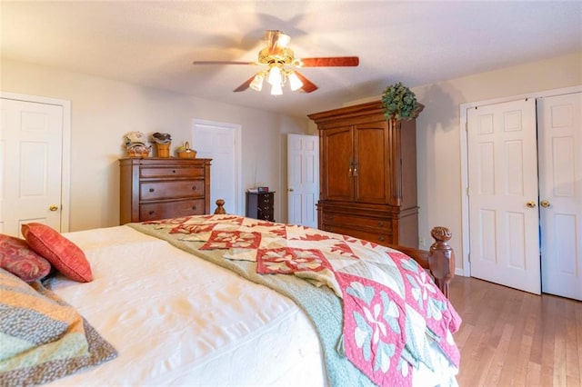 bedroom featuring ceiling fan and light hardwood / wood-style flooring