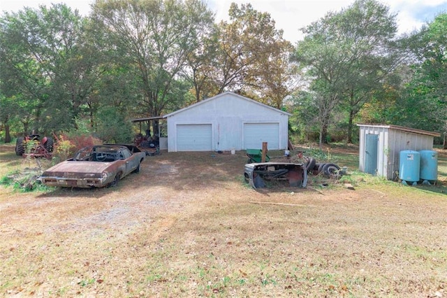 garage featuring a yard