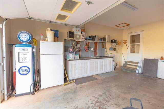 garage featuring white refrigerator