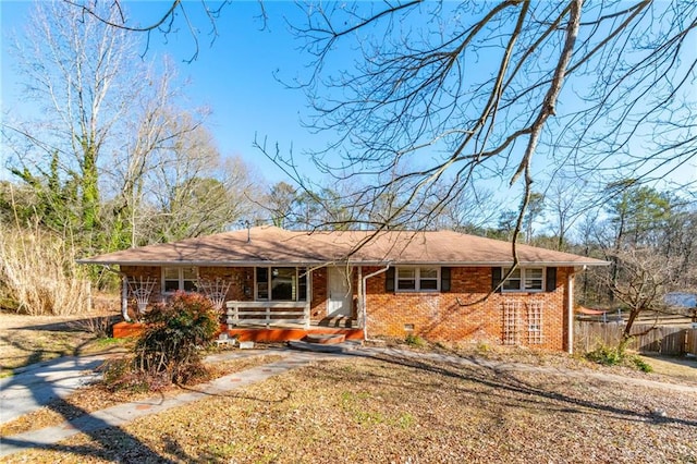 ranch-style home with a porch