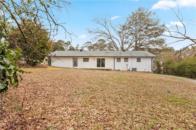 1066 Cleavemark Dr, Clarkston, GA 30021 - rear view of property featuring a lawn
