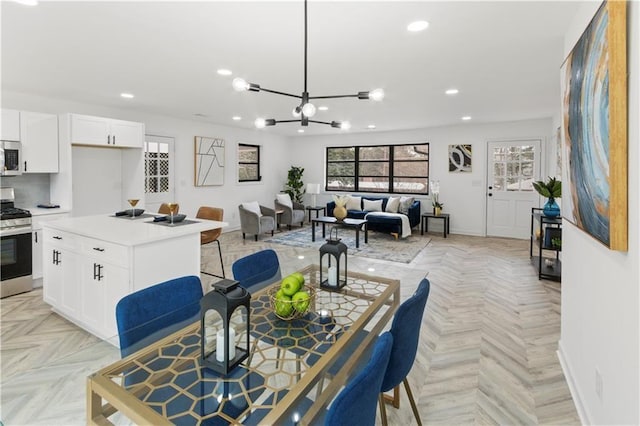 1066 Cleavemark Dr, Clarkston, GA 30021 - dining space with recessed lighting, a chandelier, healthy amount of natural light, and baseboards