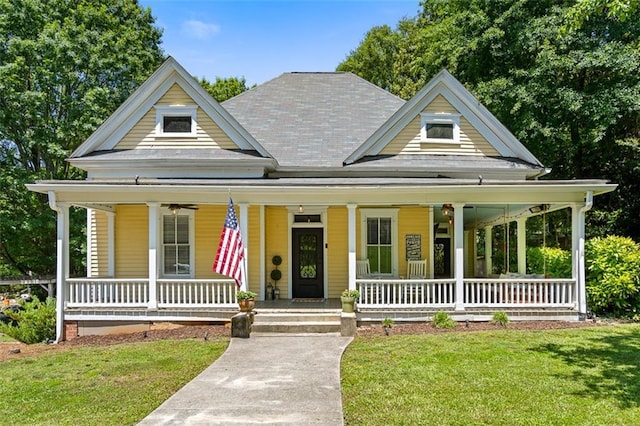 161 N Barton St, Norcross, GA 30071 - view of front facade with covered porch and a front lawn