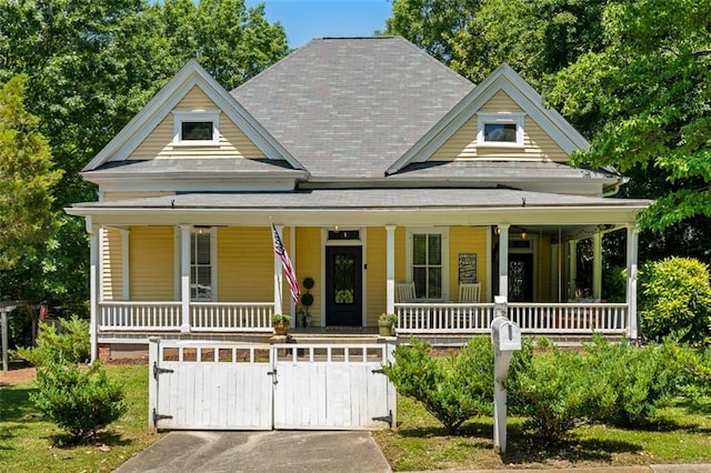 161 N Barton St, Norcross, GA 30071 - view of front of property with covered porch and roof with shingles