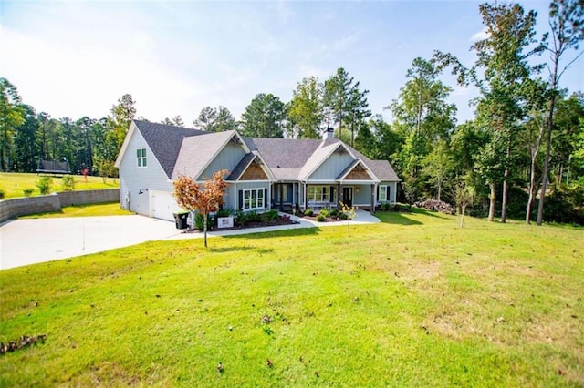 craftsman house featuring central air condition unit, a garage, and a front lawn